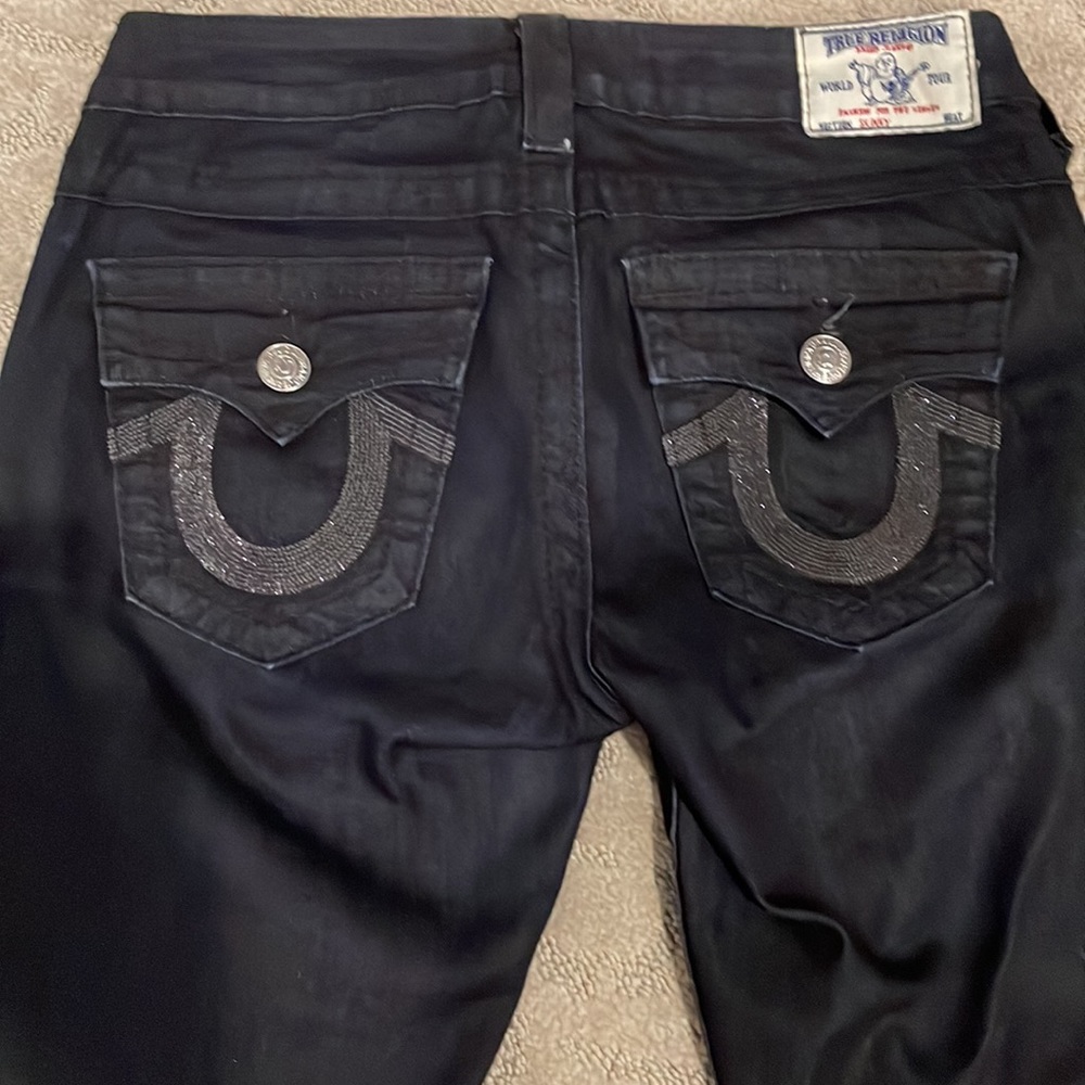 True Religion size 26 skinny jeans with decorative pockets